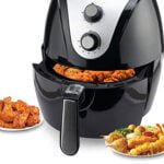 air fryer with cooked dishesh